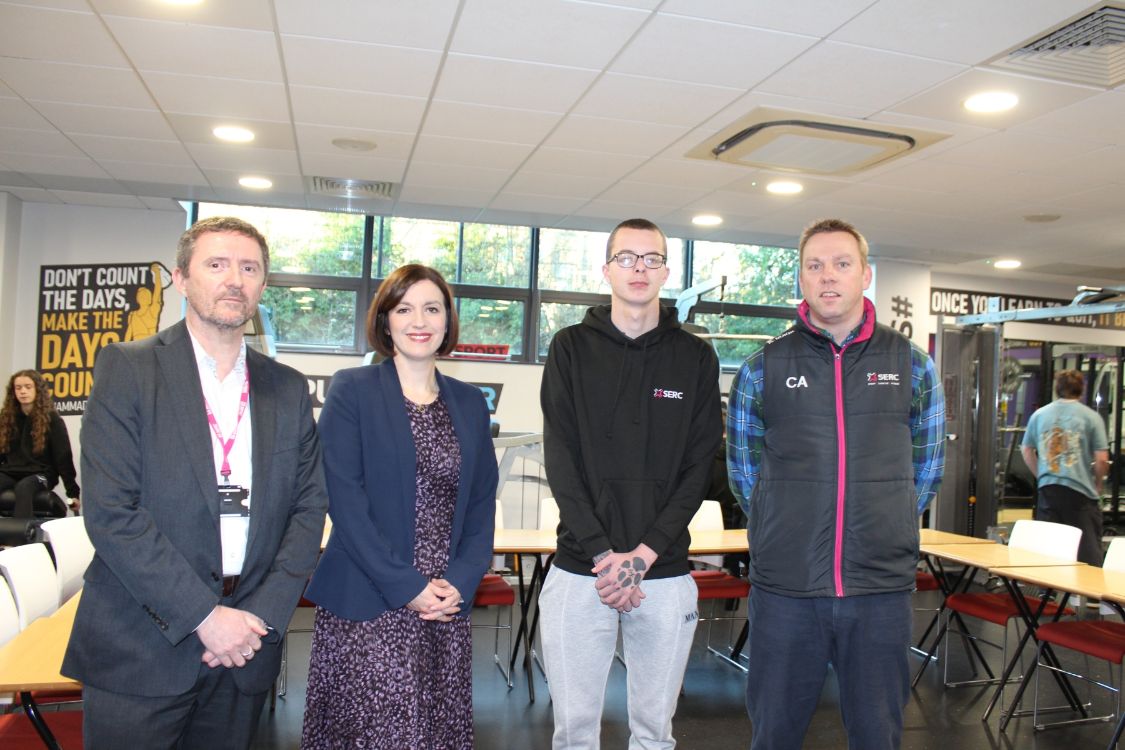 Tommy Martin, Minister, sport student Scott Rowan and Colin Atkinson